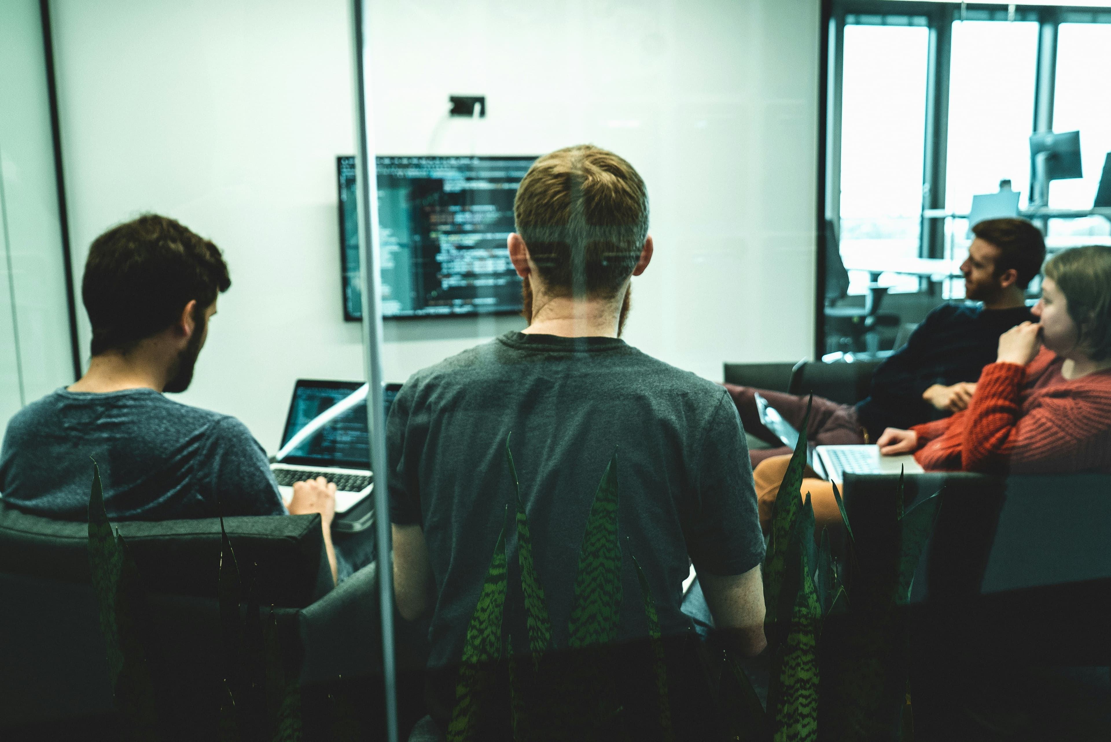 people looking at computer