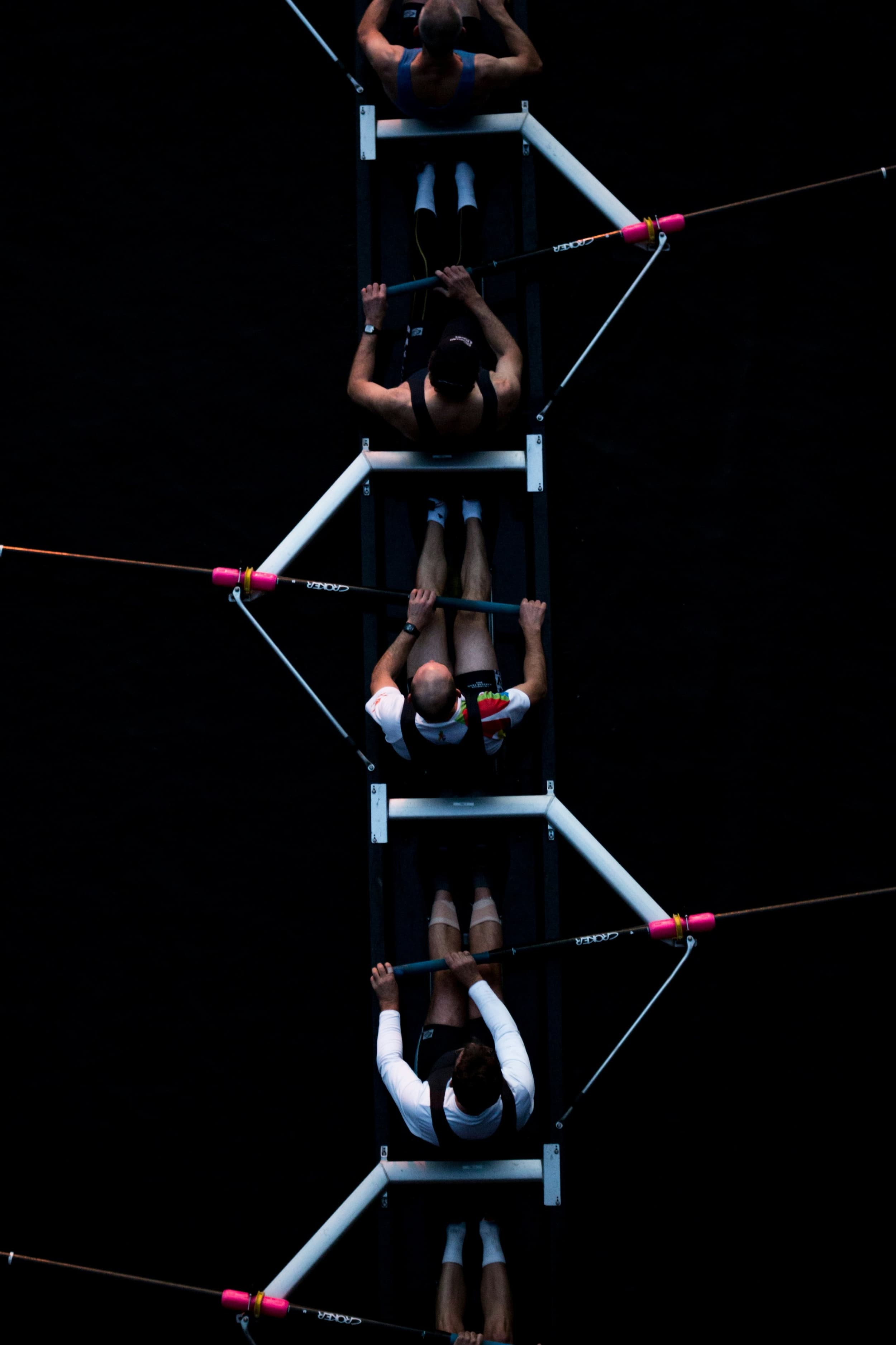 men in a boat rowing